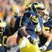 Michigan tight end Devin Funchess celebrates with teammates after scoring a touchdown during the fourth quarter at Michigan Stadium on Saturday. Melanie Maxwell I AnnArbor.com
